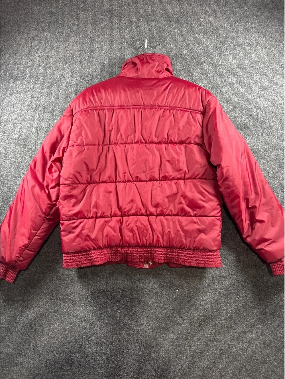 Red Quilted Puffer Jacket with Multiple Pockets and Zip Closure